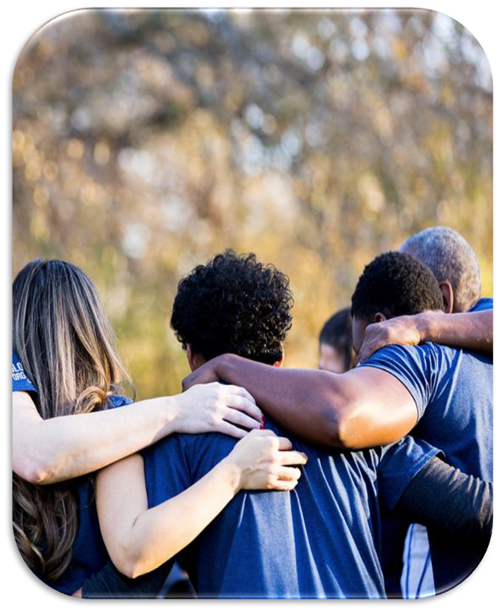 Comunidad unida en abrazo, simbolizando la integración y el apoyo mutuo