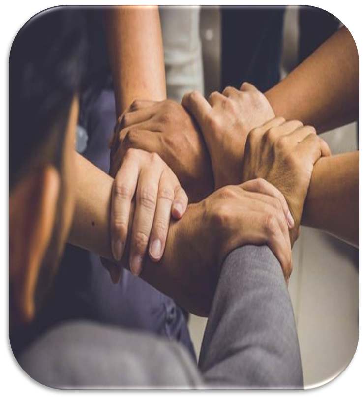 Manos unidas simbolizando trabajo en equipo, compromiso compartido y colaboración